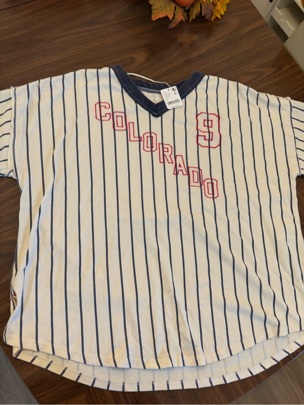 We The Free White Pinstripe V-Neck Kids Tee with Navy Trim & Red Lettering